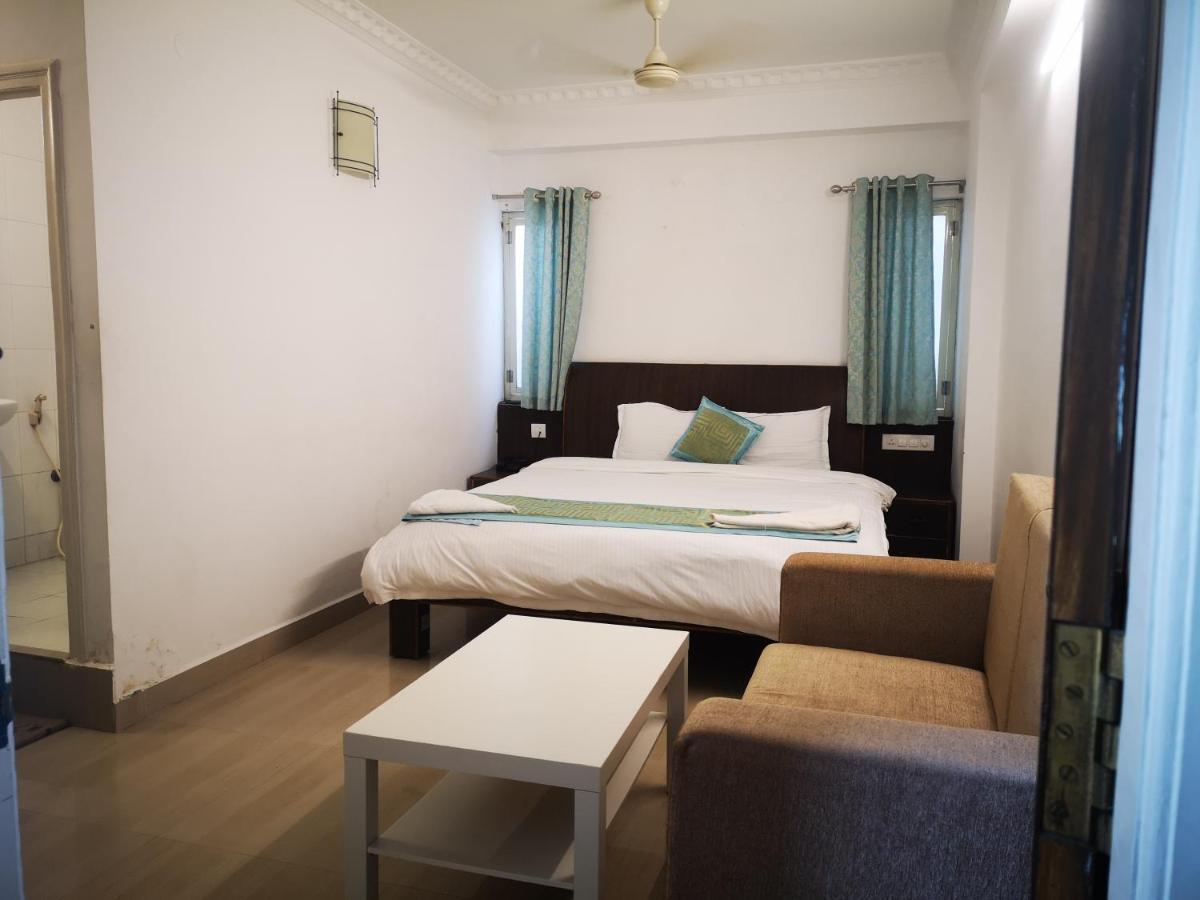 Aum Hotel Puttaparthi Bagian luar foto
