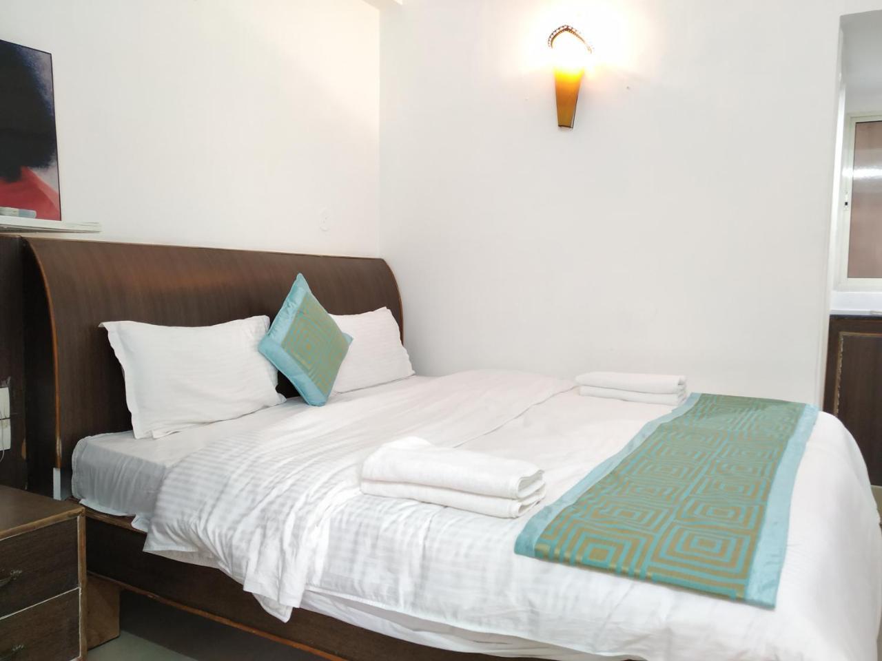 Aum Hotel Puttaparthi Bagian luar foto